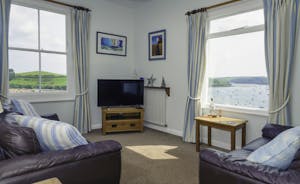 Double aspect windows in the living area, offering fabulous Salcombe Harbour views 