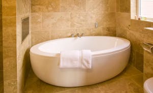Ham Bottom - Bedroom 3: a contemporary free standing bath and a separate wet area for the shower