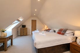 Thorncombe - Bedroom 5 is on the first floor and has an ensuite bathroom