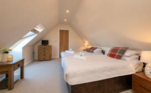 Thorncombe - Bedroom 5 is on the first floor and has an ensuite bathroom