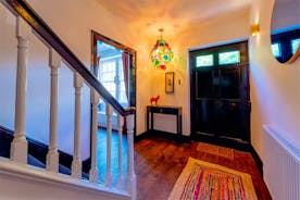Hunky-Dory - A wide hallway leads to the main or 'front' staircase