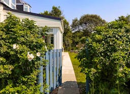 Seaview Cottage - a welcoming blue gate takes you into the garden 