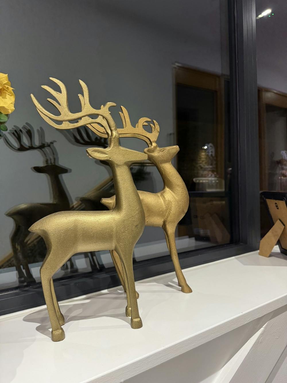 Miniature reindeer on the windowsill on the entrance to Churchill holiday let