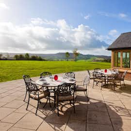 Dreamdays - Relax on the patio; the backdrop is far reaching views of the beautiful Devon landscape Dreamdays - Relax on the patio; the backdrop is far reaching views of the beautiful Devon landscape