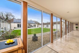 Holemoor Stables: Natural light streams in through the floor to ceiling windows