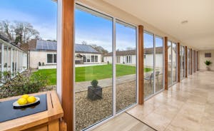 Holemoor Stables: Natural light streams in through the floor to ceiling windows