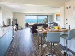 Enjoy sea views from every corner of the living/dining area