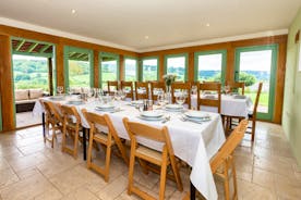 Orchard House dining room with large picture windows showcasing stunning countryside views, self catering holiday accommodation www.bhh.co.uk