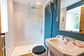 House On The Hill - Bedroom 8: and it has a delightful ensuite shower room; London tiles, a high level traditional cistern