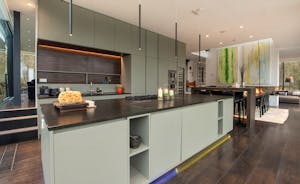 The Glass House - The Italian designer kitchen is incredibly well-equipped with a choice of ovens, a wine cooler, fridge, freezer, dishwasher and even a Tandoori oven