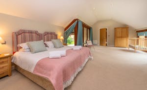 Coat Barn - Bedroom 1: spacious, light and airy with an ensuite bathroom