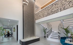 Bluewater: The hallway - a waterfall and a bespoke staircase