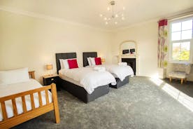 Sandfield House - Bedroom 3 sleeps 3 in a superking and a single bed, or three singles