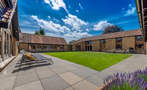 Coat Barn - The courtyard style garden; great for adults to relax and kids to play 