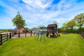 Wayside: There's a secure play area with a climbing frame, swings, a slide and trampoline
