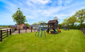 Wayside: There's a secure play area with a climbing frame, swings, a slide and trampoline