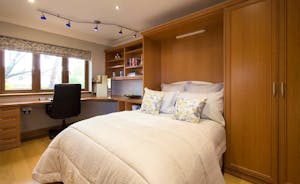 Hamble House - Bedroom 5: A double bed and a bathroom that's shared with Bedroom 4