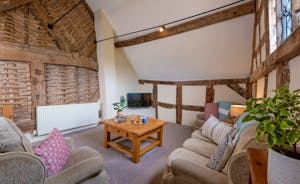 Luntley Court: Tucked away at one end of the house is a very cosy TV room/snug