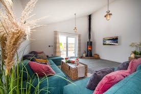 Quantock Barns - The Wagon House: Comfy seating and a wood-burner to keep you cosy on chilly days