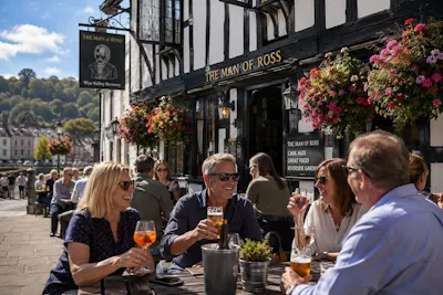 A group of adults enjoying a drink at the Man of Ross pub