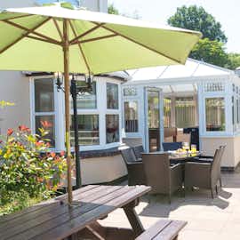 Millgrove House: The patio is quite a suntrap! Millgrove House: The patio is quite a suntrap!