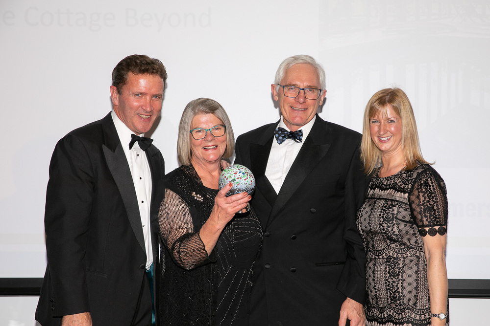Christine & Alan receiving the Gold Award from Helen Jones of Purple Cloud Consultancy & Phil de Glanville, former Bath Rugby player
