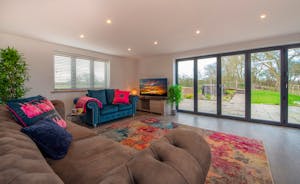 Toms Place - The living room has views over the garden and fields