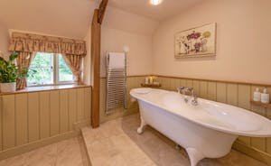 Lower Leigh - The family bathroom has a roll top bath and a separate shower