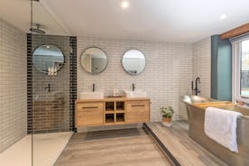 Ridgeview: The ensuite for Bedroom 3 has a stunning free standing bath and a separate shower