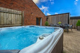 Quantock Barns - The hot tub is in the courtyard at the back of The Wagon House