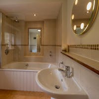 Hurstone: Country modern in the ensuite bathroom for Bedroom 6 Hurstone: Country modern in the ensuite bathroom for Bedroom 6