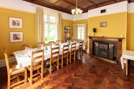 Sash windows and period fireplace for elegant dining at  Fairlea Grange in Abergavenny Monmouthshire www.bhhl.co.uk