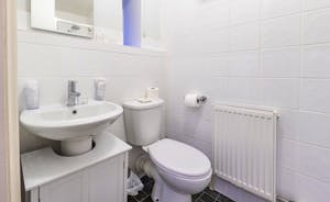 A white modern En Suite in Forest House, an 11 bed holiday house in the centre of Coleford - www.bhhl.co.uk