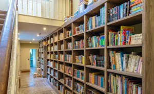 Pitsworthy: A book-lined hallway runs the length of the house
