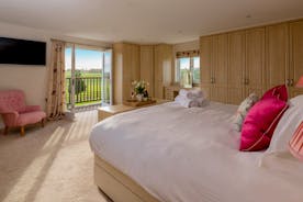 Herons Bank - Bedroom 1: Plenty of wardrobe space, wonderful far reaching views