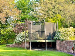 The Cottage Beyond: The little ones will have many happy hours boinging on the trampoline