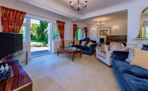 Garden Court - Get together in the sitting room for a family movie night or for games