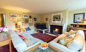 House On The Hill - The more intimate Sitting Room; homely furnishings, and the warmth of an open fire