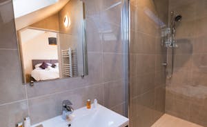 Shires - Bedroom 6 has a sleek and stylish en suite shower room