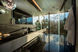 The Glass House - Bedroom 1 has a very luxurious black marble shower room
