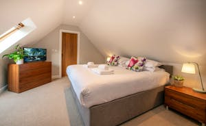 Cockercombe - Bedroom 6 is on the first floor and has an ensuite bathroom