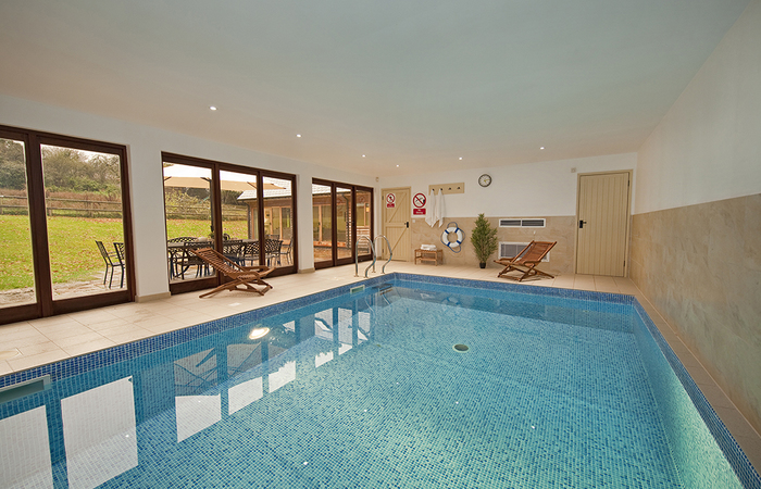 private holiday lodge with own private pool sleeps up to 14 in Somerset