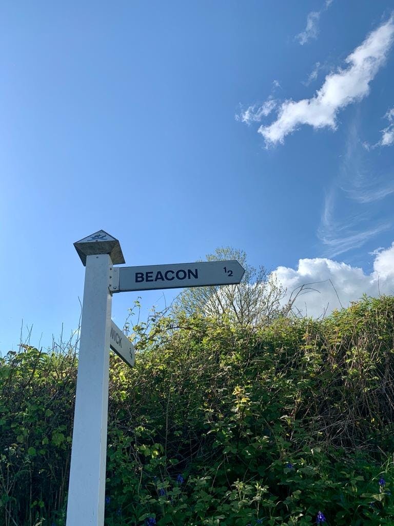 sign post to the beacon