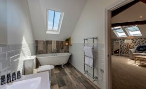 Croftview - Bedroom 12 (Blue Tit): The ensuite has a free standing bath and a walk-in shower
