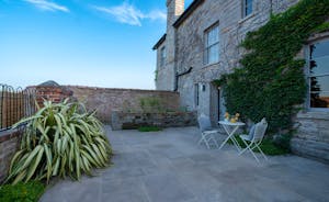 Withymans - Enjoy morning coffee in the courtyard at the back of the house