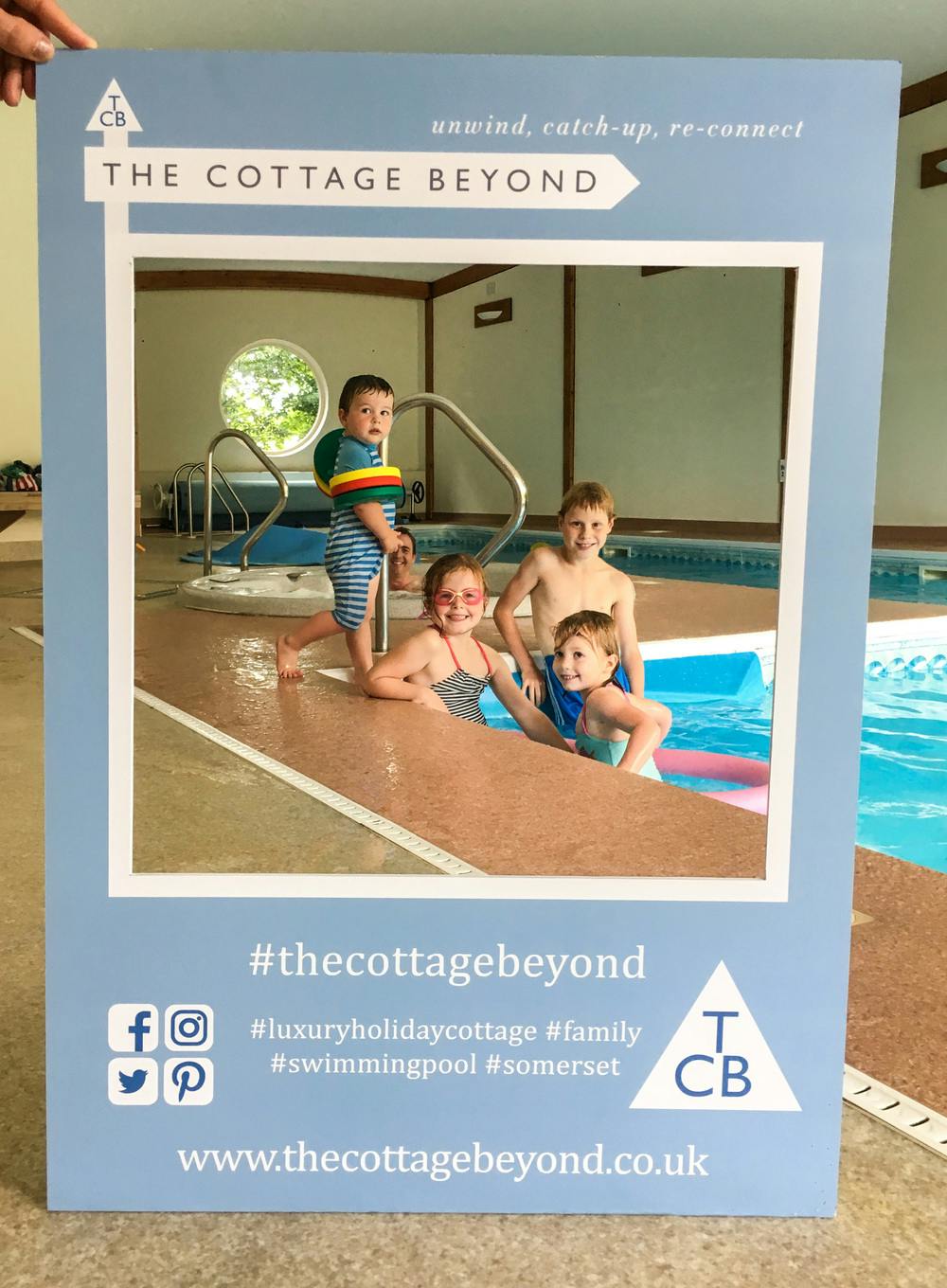 TCB's selfie board in the swimming pool