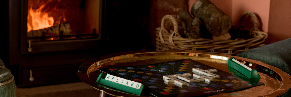Fireside game of scrabble . 