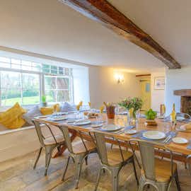 Give a brief description explaining the image e.g. large kitchen diner with seating for all 10 guests. Give a brief description explaining the image e.g. large kitchen diner with seating for all 10 guests.