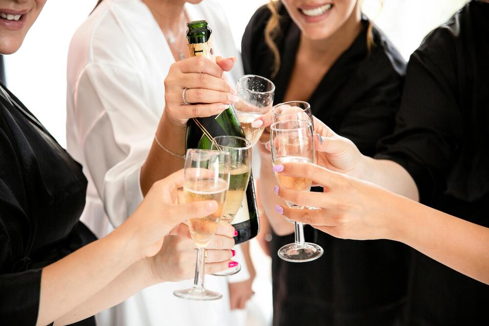 Ladies cheers with bubbly on their pamper weekend