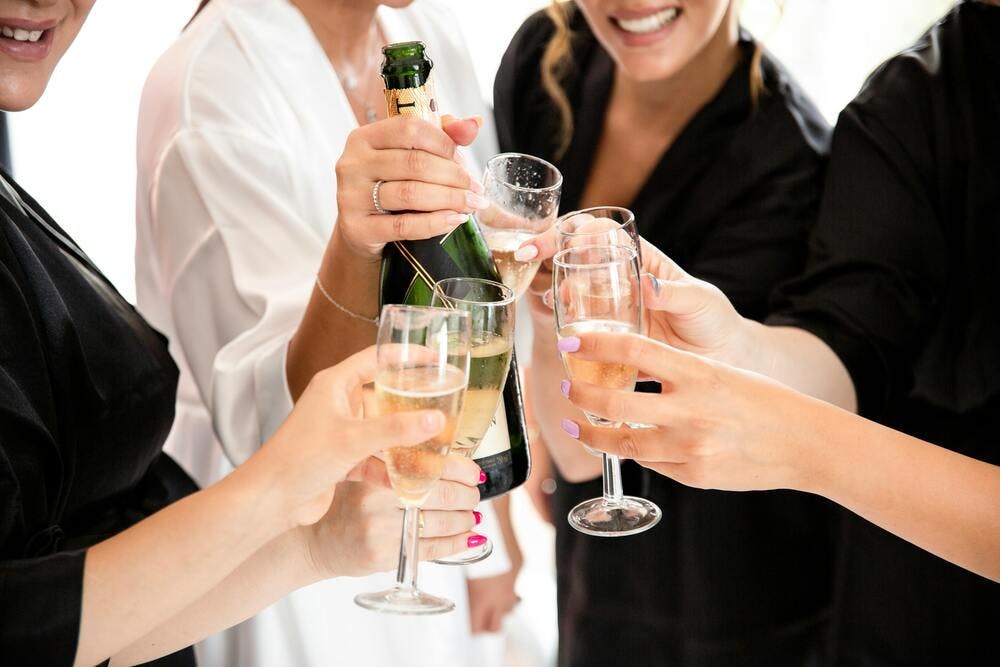 Ladies cheers with bubbly on their pamper weekend